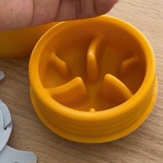Pebble Slow Feeder Toy filling in treats