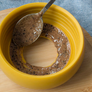Hazelnut butter on Yellow Pebble Slow feeder Toy